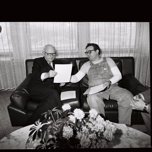 Pierre PFLIMLIN - EP President meets with French Comedian Coluche at the European Parliament in Strasbourg in February 1986