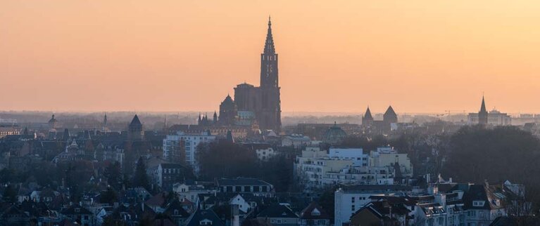 Illustration shows the sunset over the City Strasbourg