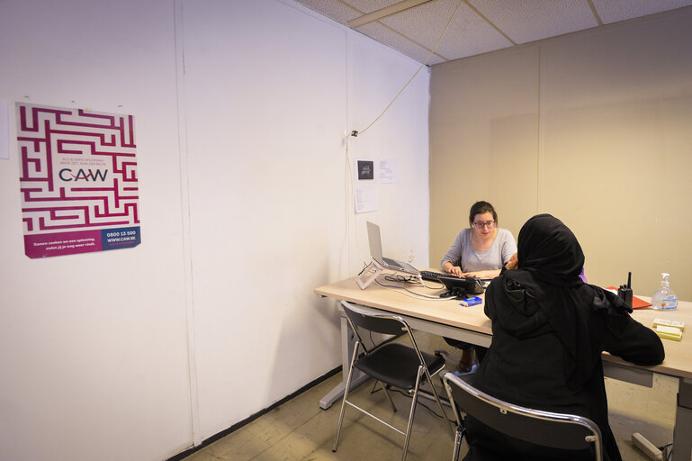 Homeless help centre in Brussels - Belgian Red Cross (Croix Rouge de Belgique) staff members  accompany  people in need through reinsertion.