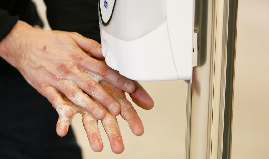 Preventing the Spread of Coronavirus Disease ( COVID-19 ) - Hand Washing with alcohol-based hand sanitizer