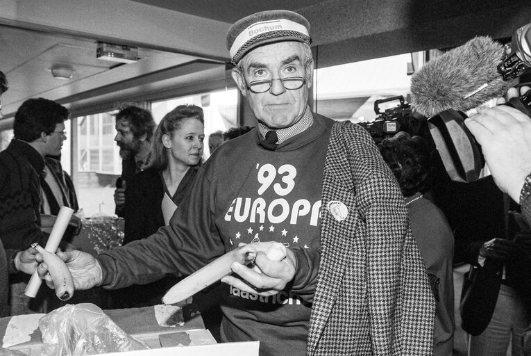 Dieter ROGALLA distributing bananas during a Europa 93 event.