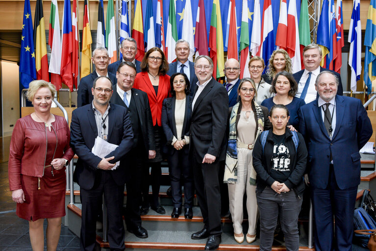 Photo 3: Family picture of the INTA committee with the Commissioner in charge of Trade