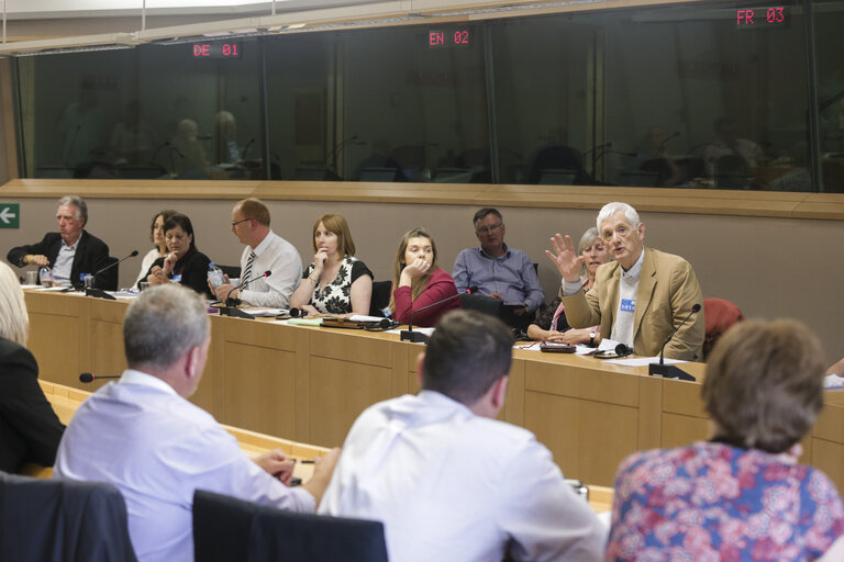 Photo 14: Liadh NI RIADA meets with a group