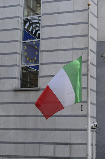 EU and Italian flags at half mast following the earthquake in Italy