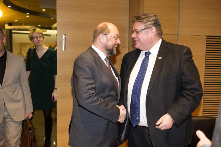 FINLAND, Helsinki: Martin  SCHULZ  (LEFT) greets with Timo SOINI (RIGHT), in meeting room of the Grand Commitee, in Annex building of the Parliament, on March 28, 2014 in Helsinki, Finland.