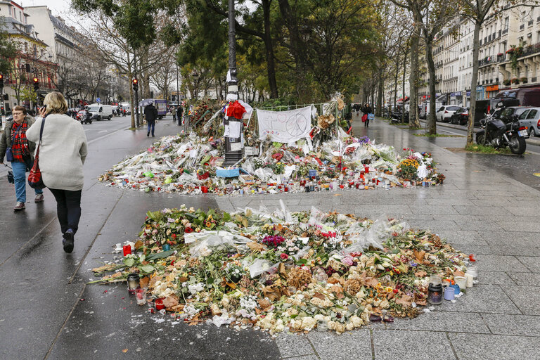 Flowers and mourning scenes in Paris where terrorist attacks took place on November 13, 2015