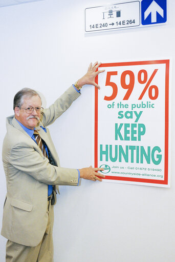 Fotogrāfija 2: MEP Roger HELMER with a banner defending the right to hunt