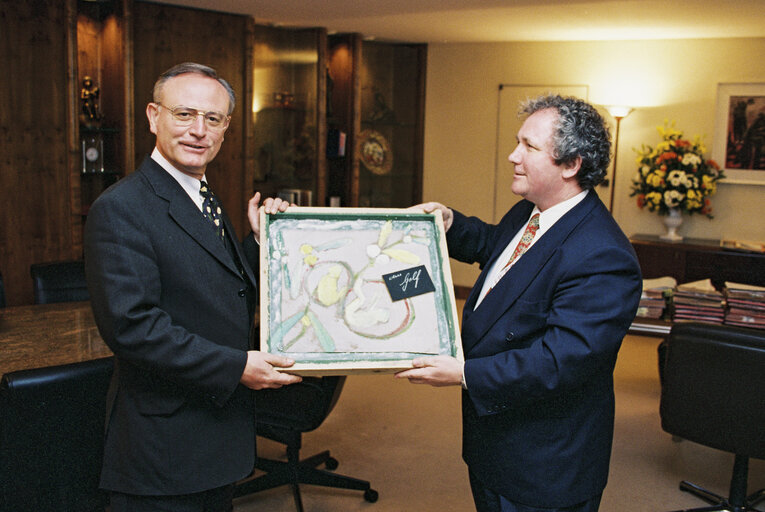 EP President receives a painting from the hands of a guest in February 1996