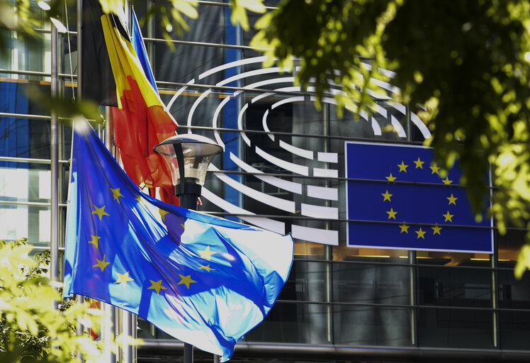 EU and Italian flags at half mast following the earthquake in Italy