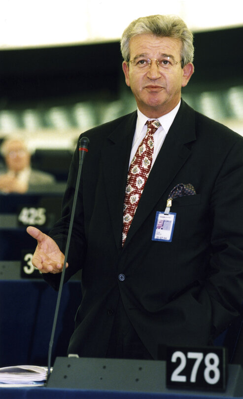 Christos Folias standing in the hemicycle of the European Parliament in Strasbourg in October 1999