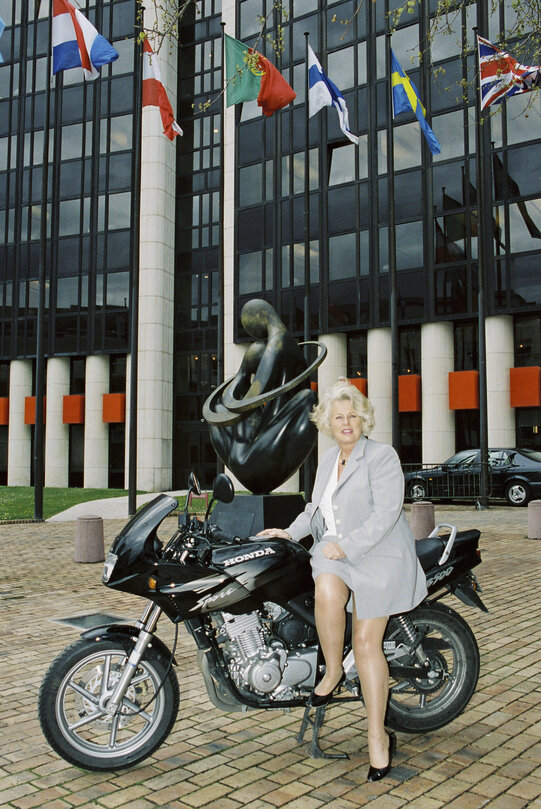 Portrait of MEP Karla M.H. PEIJS with a motorbike outisde the EP in Strasbourg