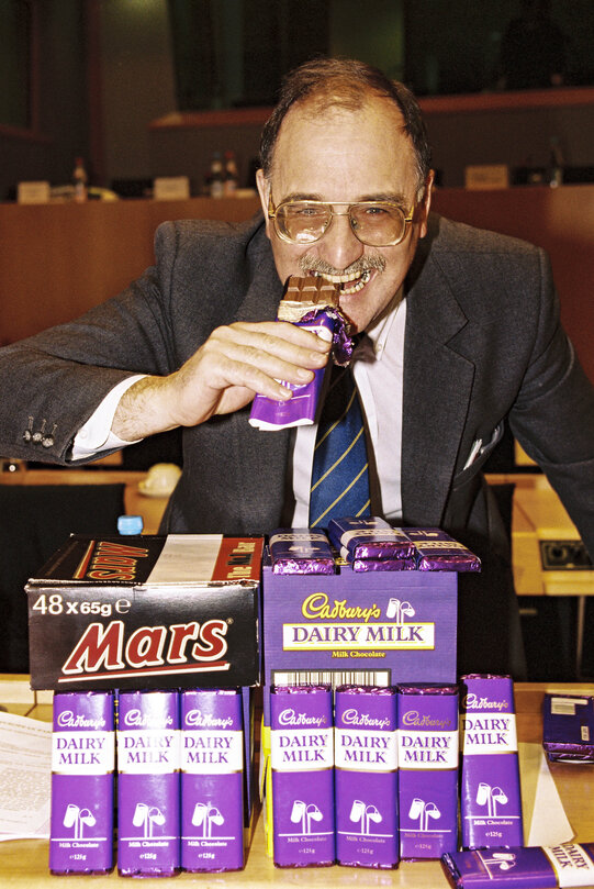 MEP David John Alfred HALLAM eats Chocolate