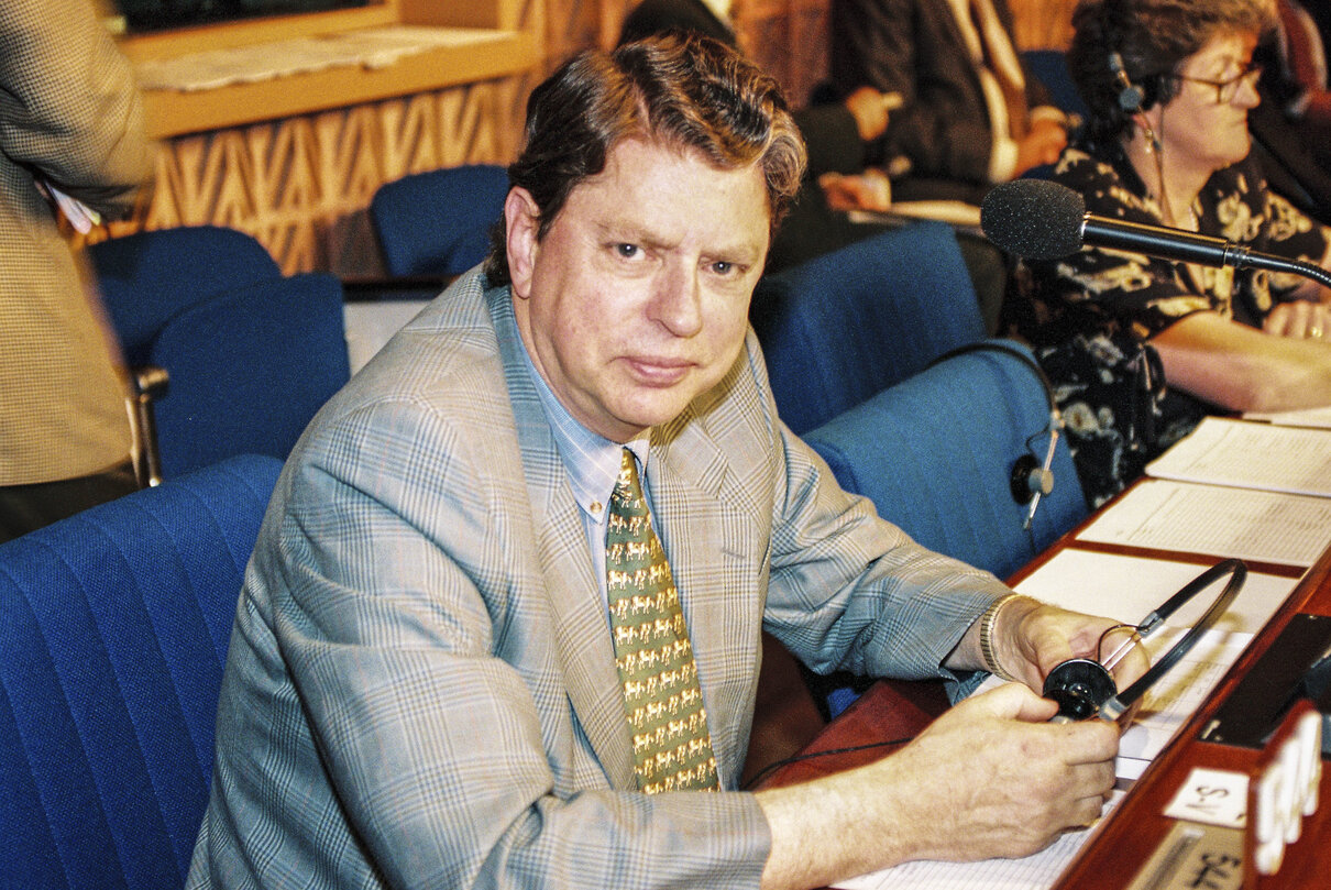 Portrait of a Mep in the hemicycle at the European Parliament in Strasbourg