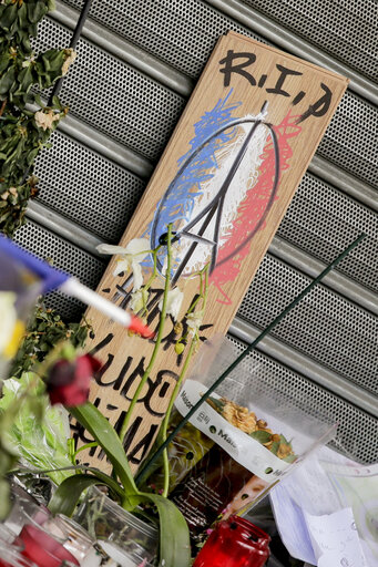Flowers and mourning scenes in Paris where terrorist attacks took place on November 13, 2015