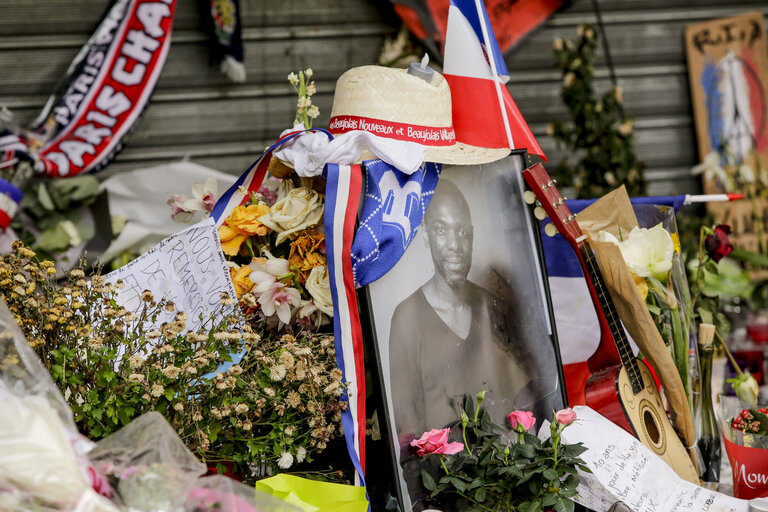 Flowers and mourning scenes in Paris where terrorist attacks took place on November 13, 2015