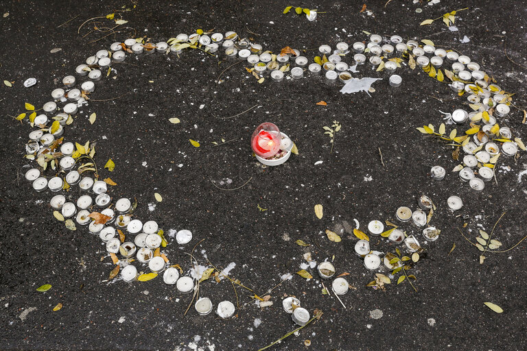 Flowers and mourning scenes in Paris where terrorist attacks took place on November 13, 2015