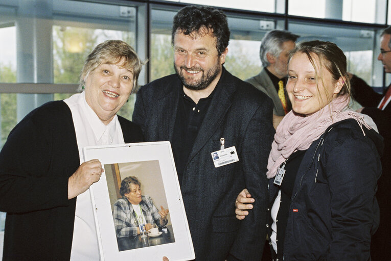 Photo 8: MEPs receiving Pictures of them at the European Parliament in Strasbourg