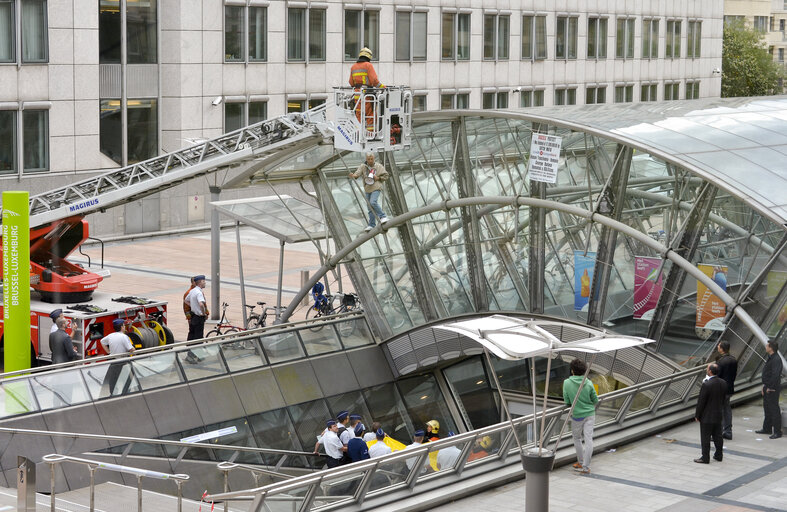 Firemen in action in front of European Parliament