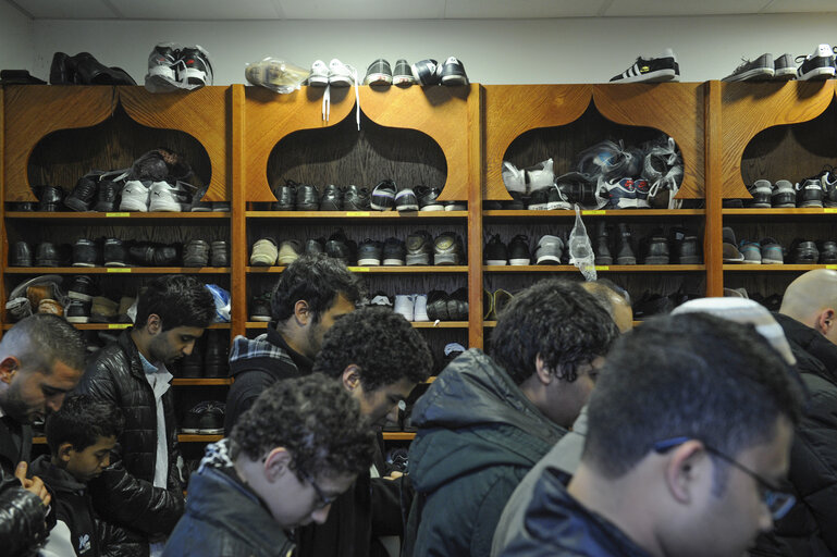 Muslims praying in the Strasbourg Mosque