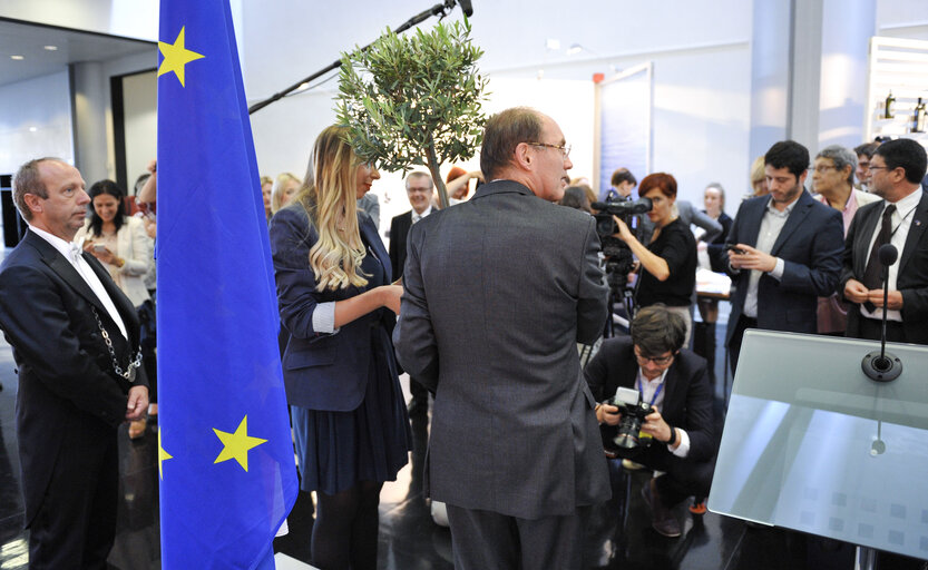 Suriet 2: Croatia Exhibition.  Official ceremony at the occasion of the Croatian Membership in the European Union: planting of an olive tree in the Gallery Nord Exhibition space