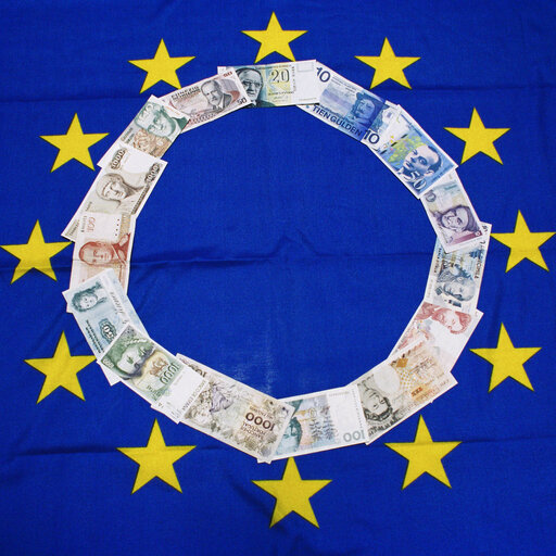 European banknotes on a European flag