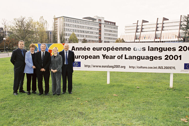 MEPs pose in front of a poster for the launch of the European Year of Languages 2001