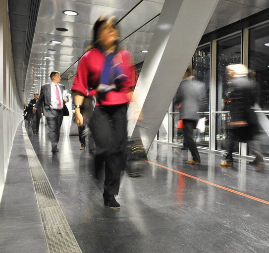 People walking across the passerelle between WIC and LOW building in Strasbourg