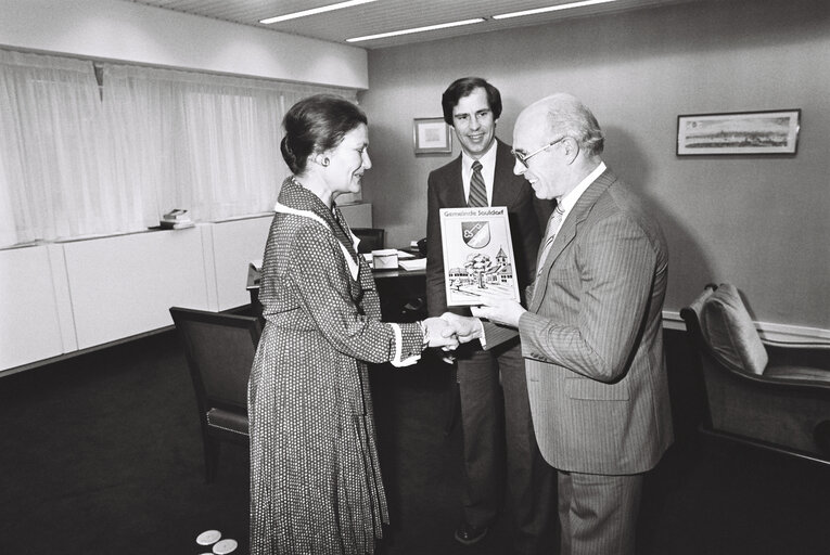 The European Parliament President Simone VEIL receiving a book from the MEP Isidor W. FRUH in July 1980.