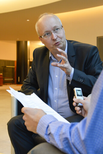 Photo 8: Interview of a MEP Mikael GUSTAFSSON by a Finnish journalist.