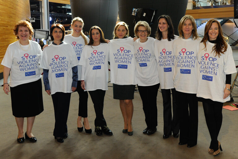 Photo 1: MEPs wear T-Shirts with Stop Violence Against Women