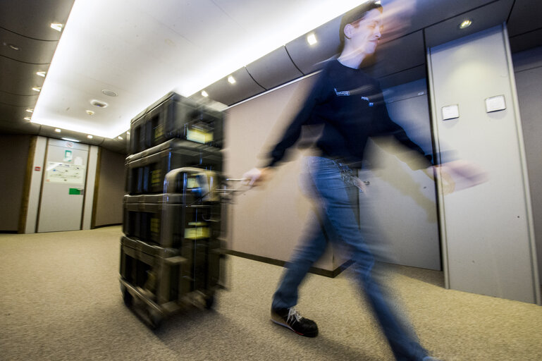 Movers transporting canteens from Brussels to Strasbourg