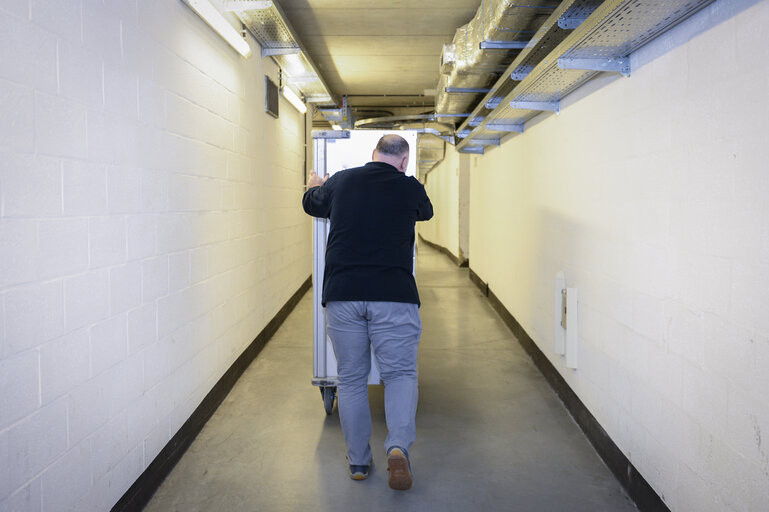 Movers transporting canteens from Brussels to Strasbourg