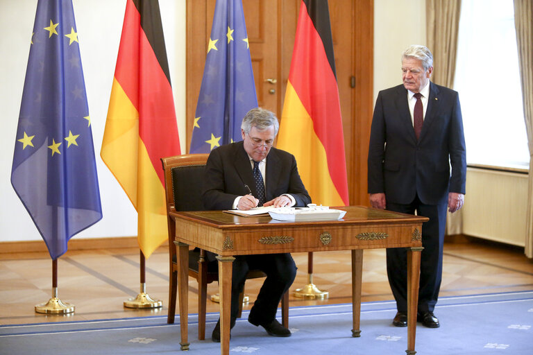 Official visit of the President of the European Parliament to Germany - Antonio TAJANI, president of the European parliament (L), signs the guest book at Schloss Bellevue as he meets with German President Joachim GAUCK on February 24, 2017, in Berlin, Germany.