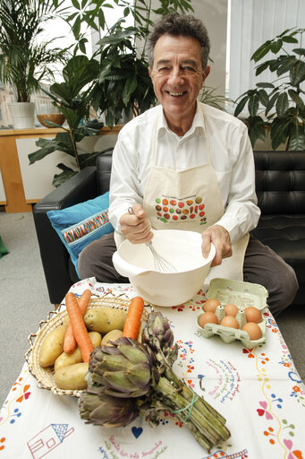 MEP Yves COCHET holding vegetables