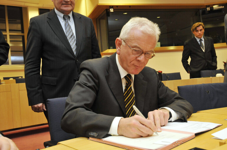 Photo 5: Official signing of LEX, European legislation into law, on Political Parties and on Humanitarian Aid