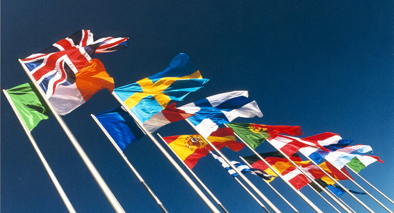 Photo 20: Flags of country members of the European Union floating in the wind