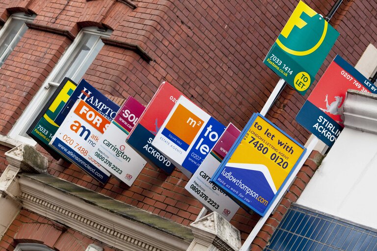 Photo 7 : For sale signs in the streets of London indicate the great impact the EU financial crisis is having on businesses and people in the UK.