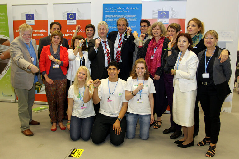 Matthias Groote and Karl-Heinz Florenz in a group photo of European Parliament Delegation with representatives of the YOUthinkgreen movement On the sidelines the United Nations Climate Change conference in Doha, Qatar, Friday, Dec.7, 2012 (Photo/mohamed farag)