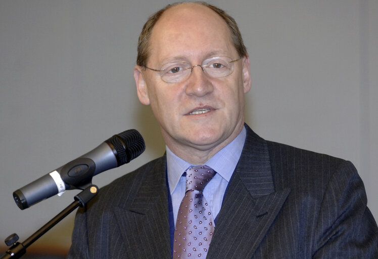 MEP Jonathan EVANS delivers a speech in Brussels