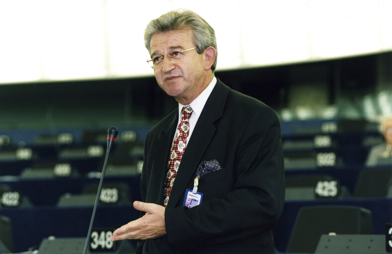 Photo 4 : Christos Folias standing in the hemicycle of the European Parliament in Strasbourg in October 1999