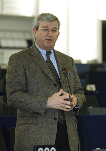 Photo 2 : Christos Folias standing in the hemicycle of the European Parliament in Strasbourg in March 2002