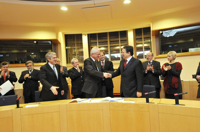 Photo 12: Official signing of LEX, European legislation into law, on Political Parties and on Humanitarian Aid