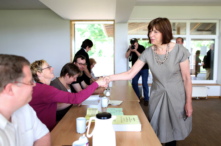 Rebecca  HARMS  (R), member of the European Parliament from German Green Party (Buendnis'90/Die Gruenen) and Candidate for the european elections, arrives at the polling station before voting for the European parliament elections on May 25, 2014 in Waddeweitz, northern Germany.