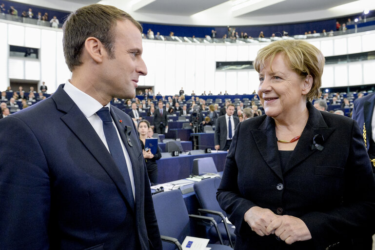 European Ceremony of Honour for Dr. Helmut KOHL - Discussion between Emmanuel MACRON, President of the French Republic, on the left, and Angela MERKEL, German Federal Chancellor