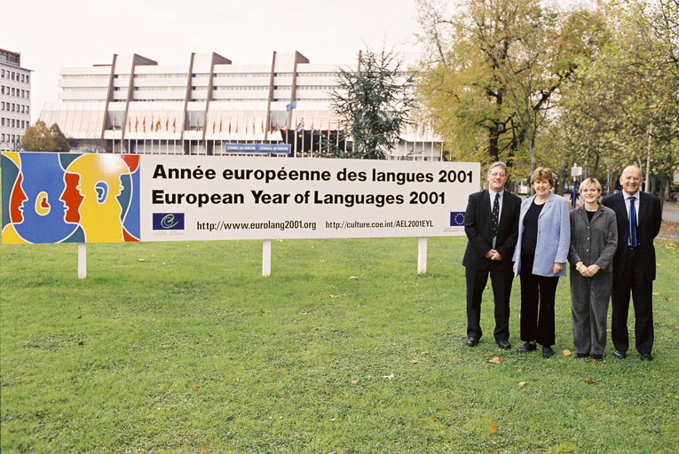 MEPs pose in front of a poster for the launch of the European Year of Languages 2001