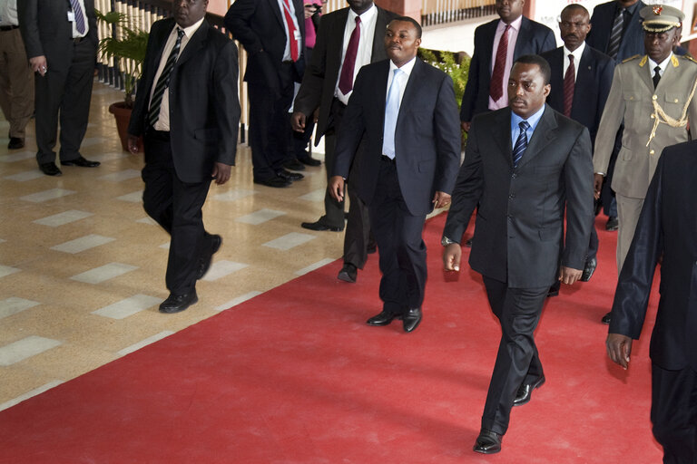 Joseph Kabila, right, President of the Democratic Republic of Congo, arrives at the formal opening of the 20th ACP-EU Joint Parliamentary Assembly in Kinshasa on December 2, 2010.