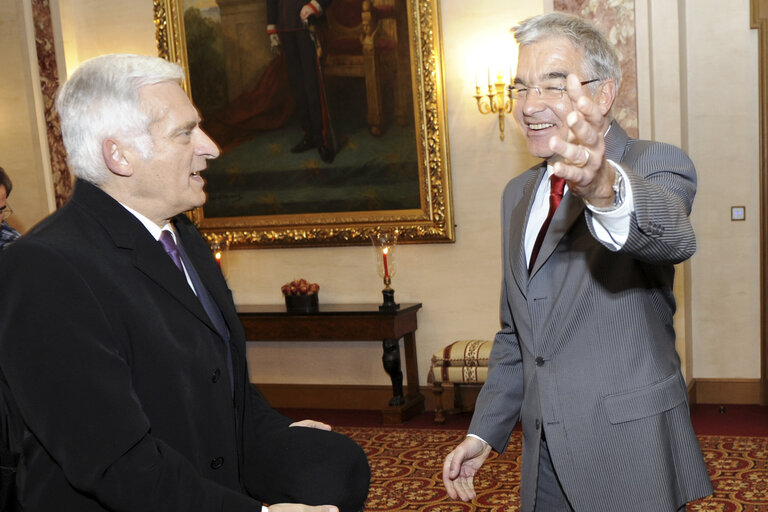 European Parliament President Jerzy Buzek (L) smiles with President of Chamber Laurent Mosar while he leaves the Chamber of Deputies on November 09, 2010 in Luxembourg.