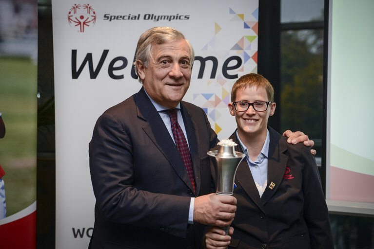 Handing over the Olympic torch to Antonio TAJANI, EP President - Special Olympics Winter Games