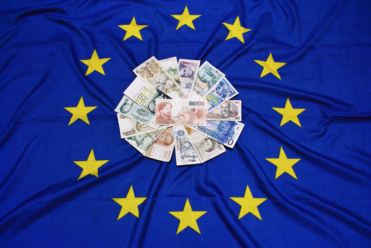 European banknotes on a European flag