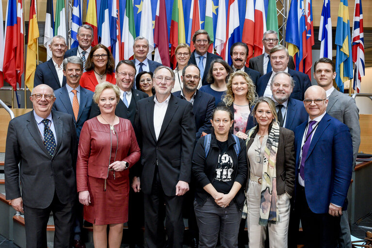 Photo 1: Family picture of the INTA committee with the Commissioner in charge of Trade